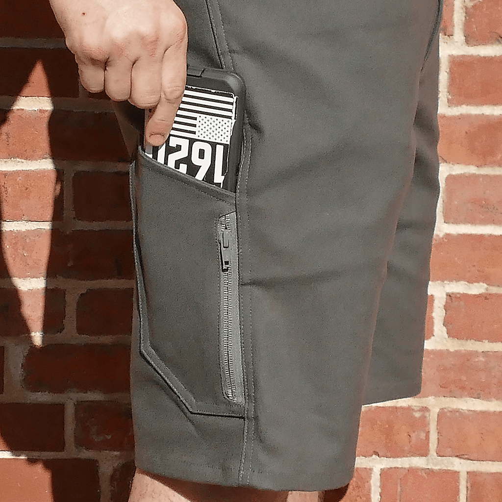 Grey 1620 16d Utility Shorts featuring Side Utility and Zippered Pocket with phone inside